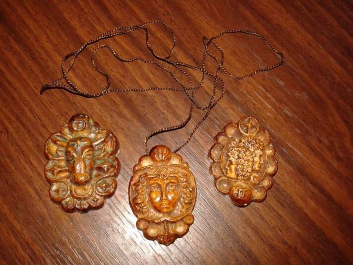 Wooden zodiac signs provide protection against negativity and misfortune